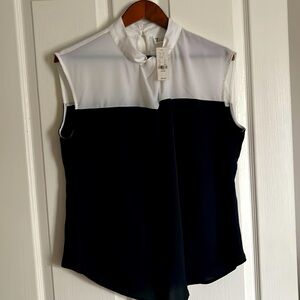 NWT - NYC beautiful sleek and Silky sleeveless blouse, Very Dark Blue